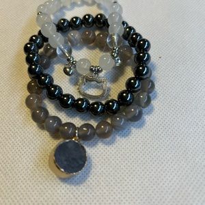 Three beautiful bracelets in grays, black and white beads